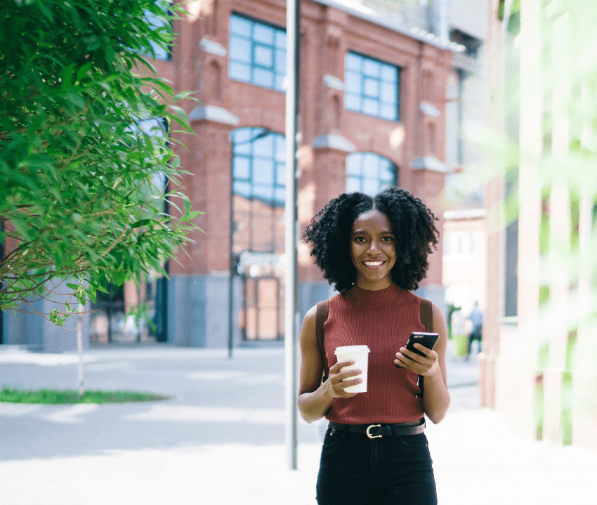 a happy woman after undergoing trauma therapy in chicago